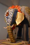 Golden trunk and ears, and jewelled head dress